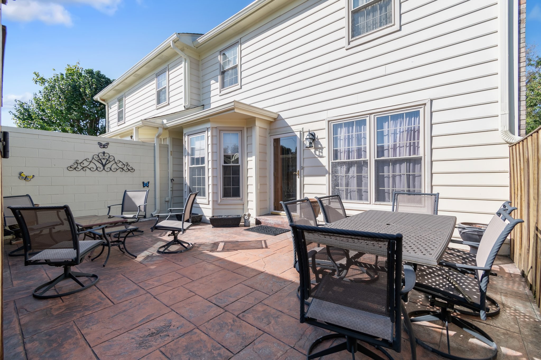1359 General George Patton Road Nashville, TN 37221 - Photo 40 of 41 a view of a dinning table and chairs in the patio