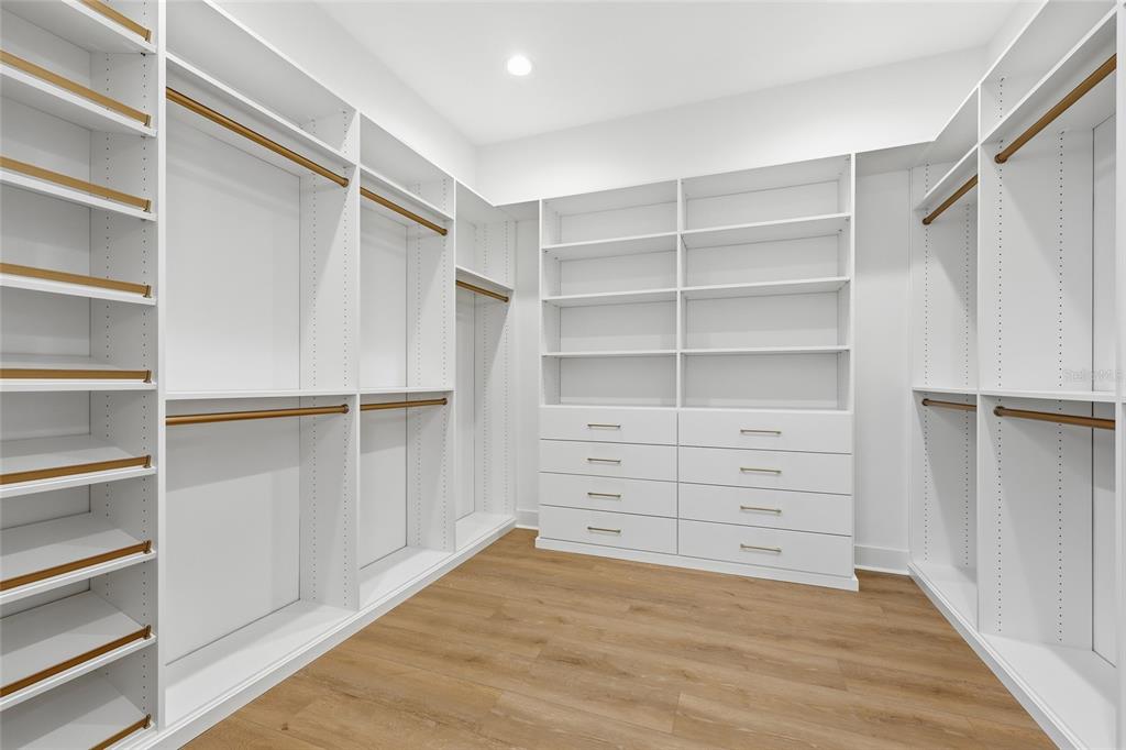 1063 Southwest 135th Way Newberry, FL 32669 - Photo 27 of 42 a view of walk in closet with empty racks