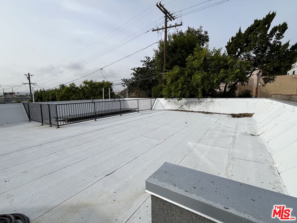 1339 South Hudson Avenue Los Angeles, CA 90019 - Photo 2 of 17 a view of a terrace