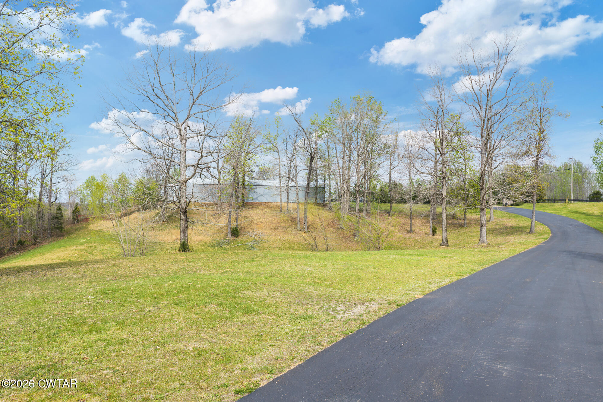272 Rivers Edge Drive Bath Springs, TN 38311 - Photo 10 of 18 a view of an outdoor space and swimming pool
