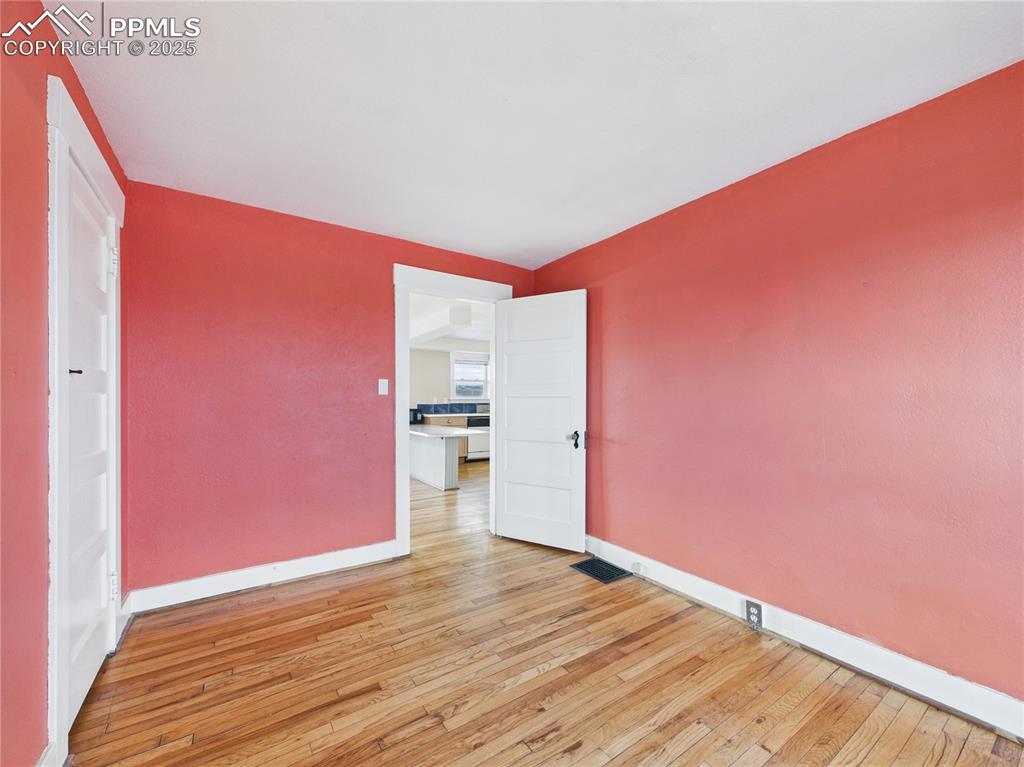 6601 Pickney Road Rye, CO 81069 - Photo 12 of 33 a view of empty room with wooden floor