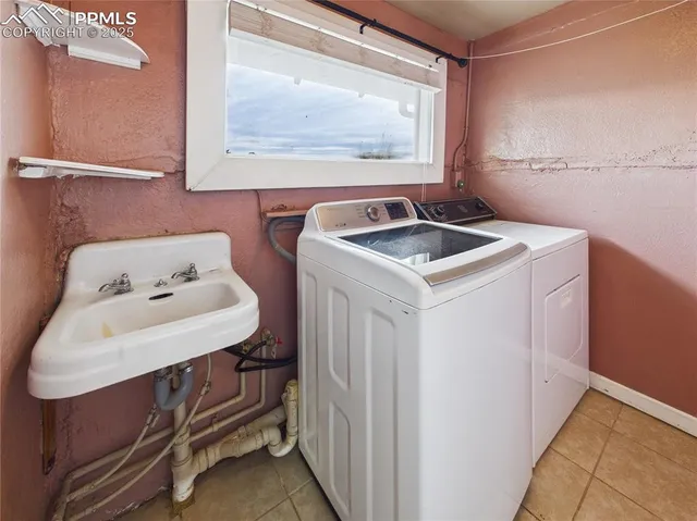 a utility room with dryer and washer