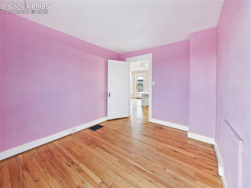 6601 Pickney Road Rye, CO 81069 - Photo 22 of 33 a view of an empty room with wooden floor
