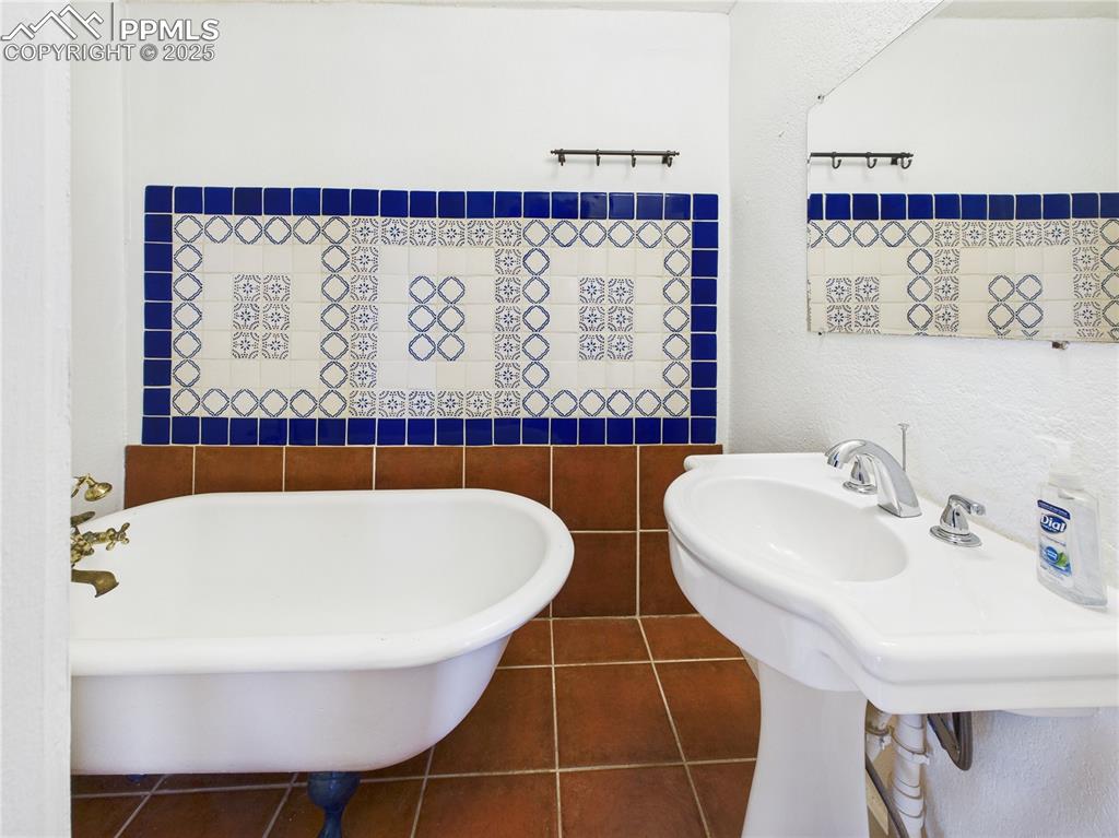 6601 Pickney Road Rye, CO 81069 - Photo 23 of 33 a bathroom with a sink and a mirror