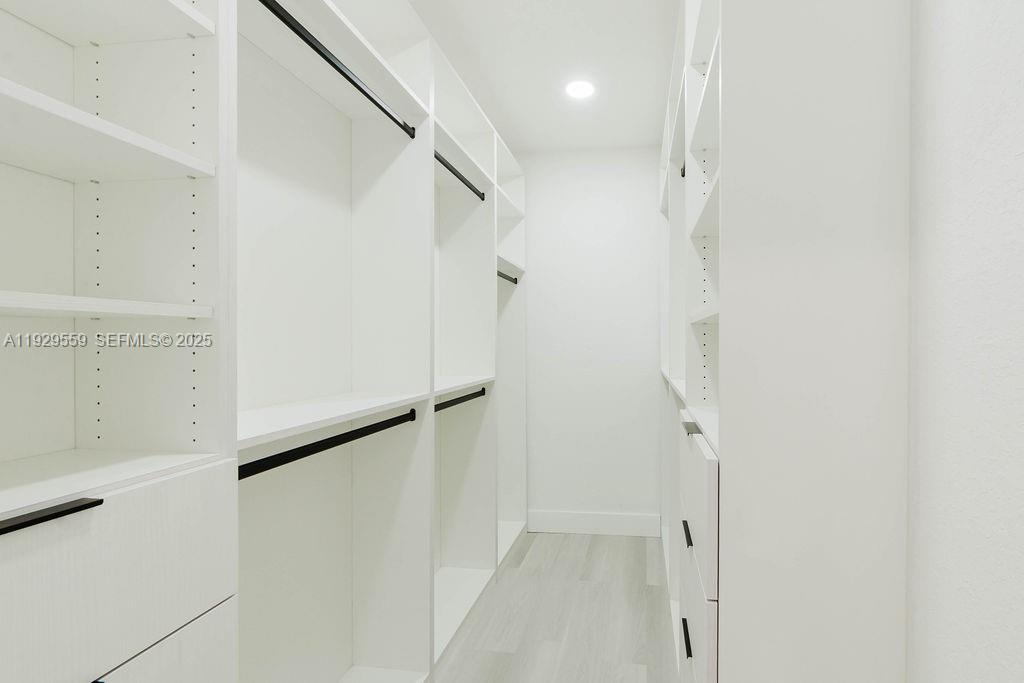 2101 Southwest 16th Terrace Miami, FL 33145 - Photo 19 of 55 Primary Bedroom Walking-closet