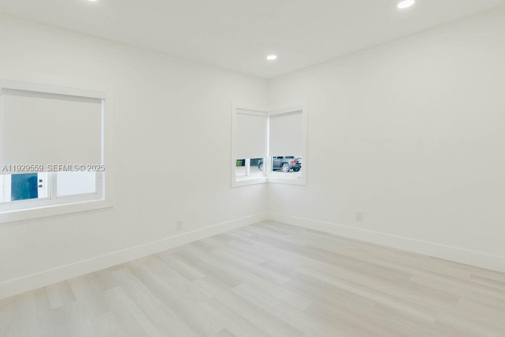 2101 Southwest 16th Terrace Miami, FL 33145 - Photo 27 of 55 an empty room with a empty space and windows