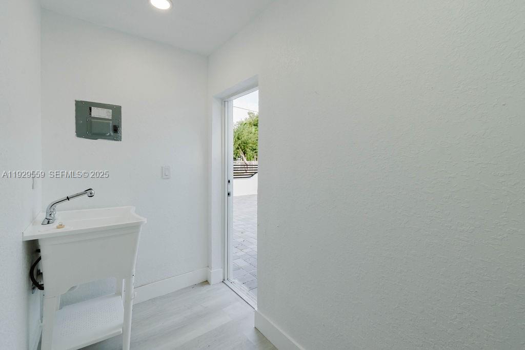 2101 Southwest 16th Terrace Miami, FL 33145 - Photo 46 of 55 a bathroom with a sink and a window