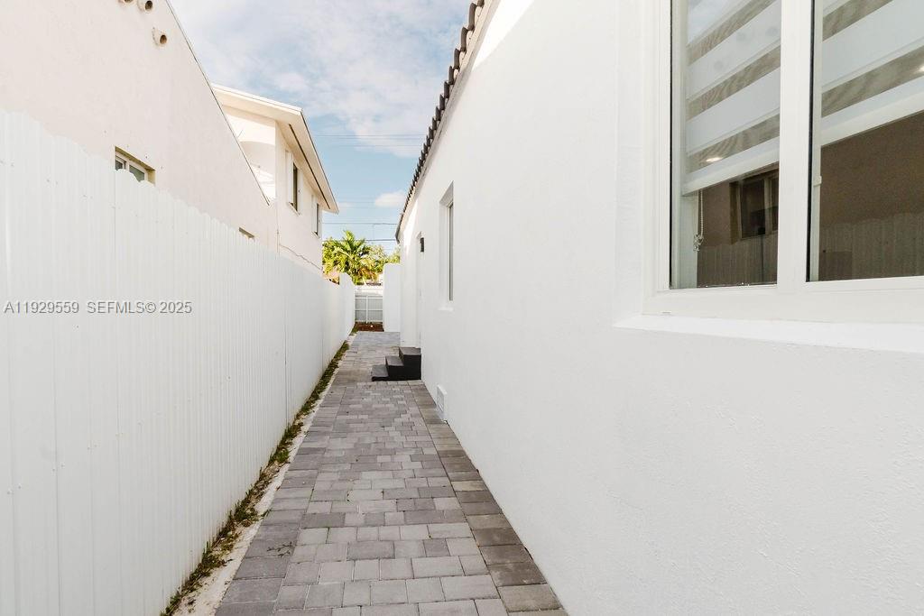 2101 Southwest 16th Terrace Miami, FL 33145 - Photo 48 of 55 a view of a hallway with wooden floor and staircase