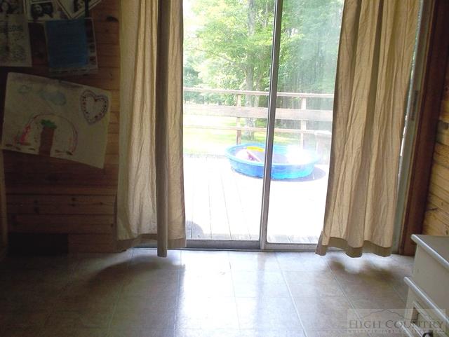 2841 Glade Valley Road Sparta, NC 28675 - Photo 8 of 15 a view of an empty room and window