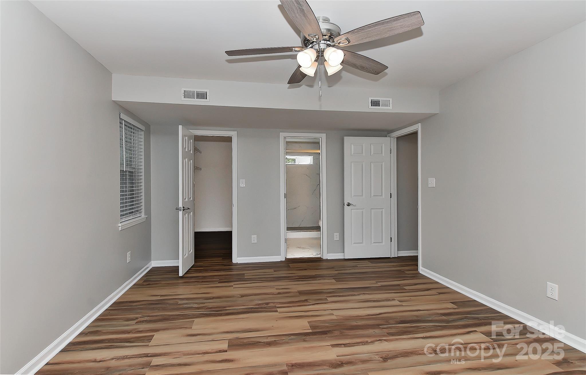 8056 Hunley Ridge Road Matthews, NC 28104 - Photo 19 of 37 a view of a livingroom with wooden floor
