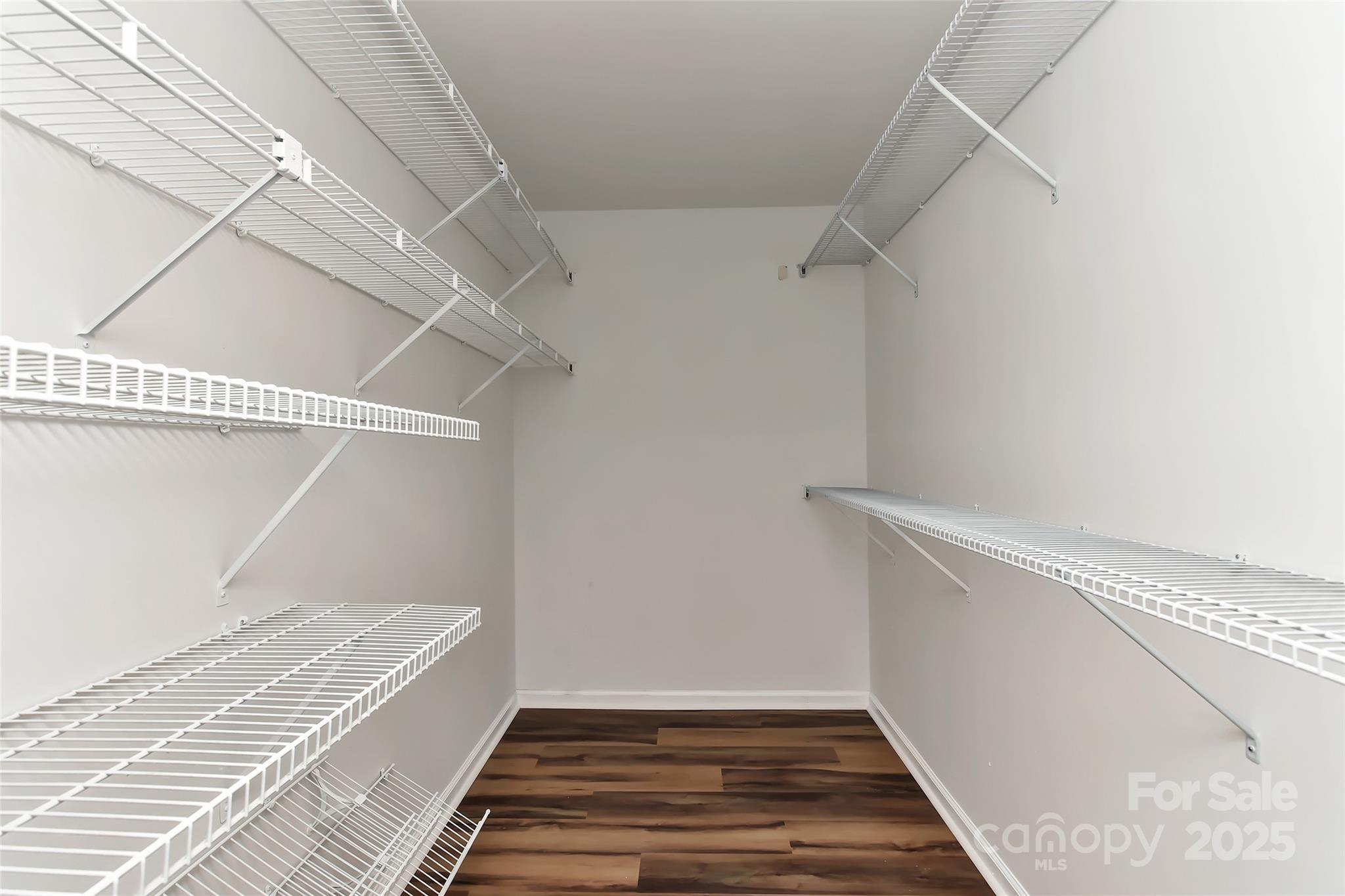 8056 Hunley Ridge Road Matthews, NC 28104 - Photo 23 of 37 a view of a room with racks on the wall