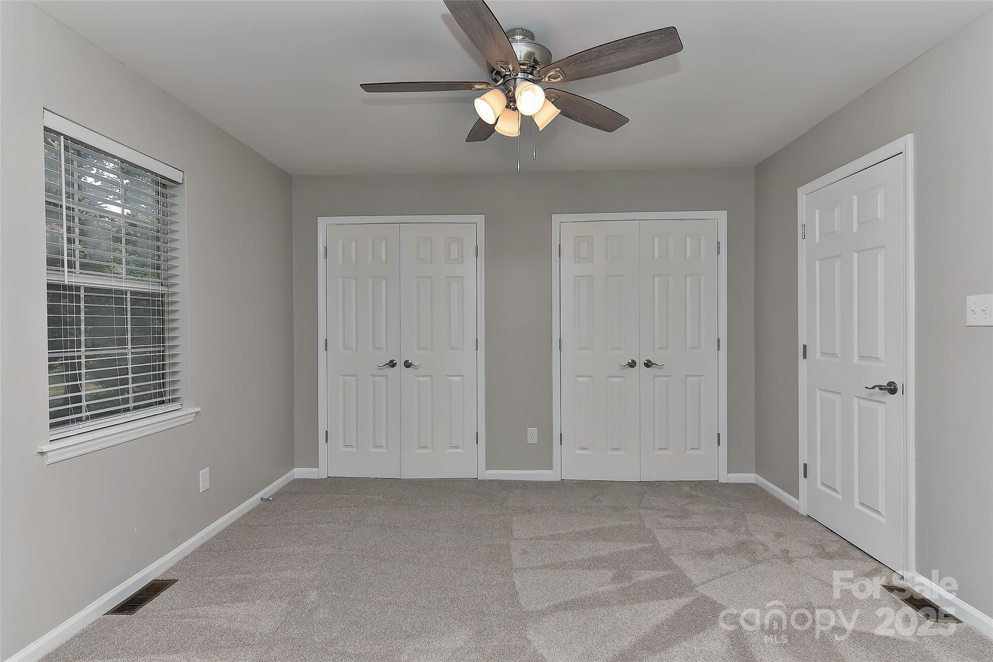8056 Hunley Ridge Road Matthews, NC 28104 - Photo 25 of 37 a view of an empty room with a window