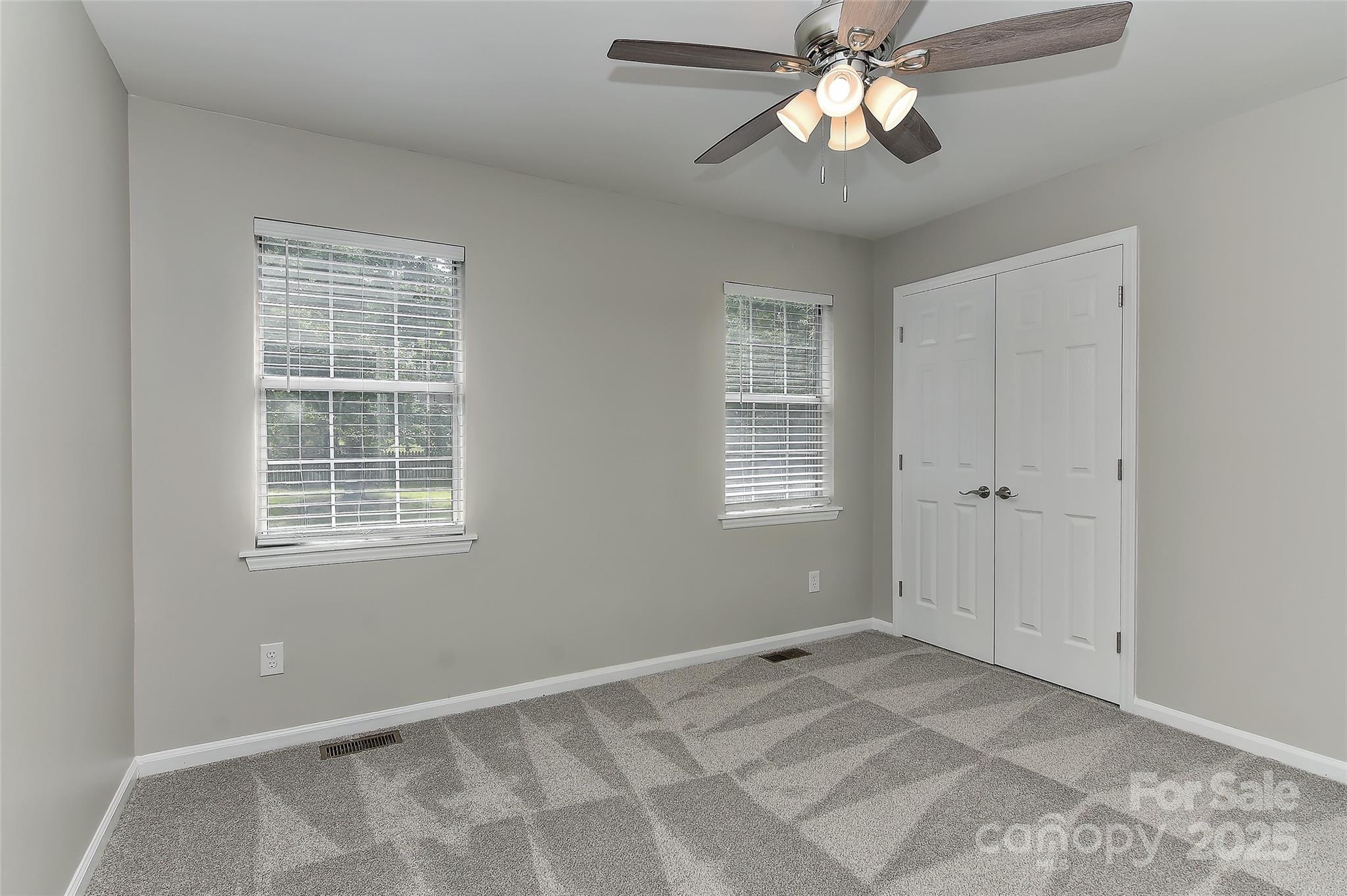 8056 Hunley Ridge Road Matthews, NC 28104 - Photo 26 of 37 a view of an empty room with a window