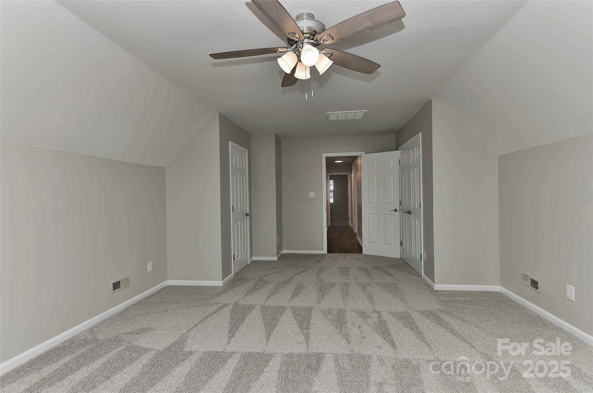 8056 Hunley Ridge Road Matthews, NC 28104 - Photo 28 of 37 a view of a livingroom with a ceiling fan and window