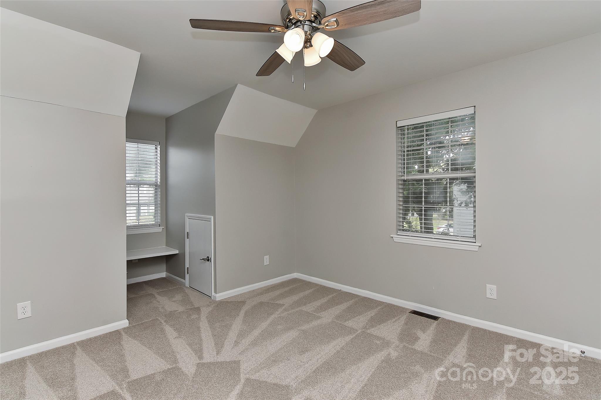 8056 Hunley Ridge Road Matthews, NC 28104 - Photo 29 of 37 a view of an empty room with a window