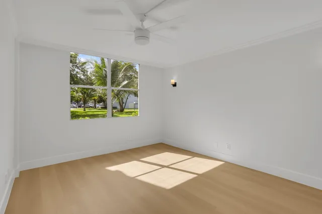 an empty room with windows