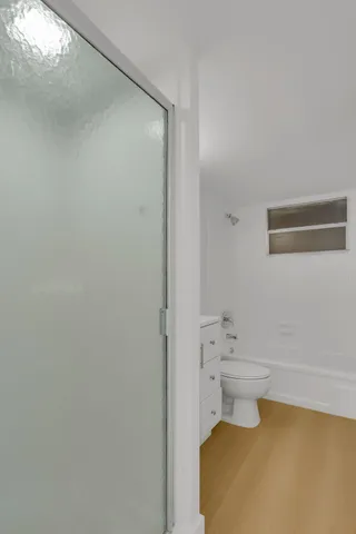 a bathroom with a sink and a toilet