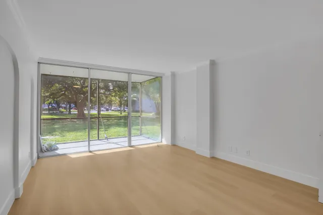 a view of a room with a large window