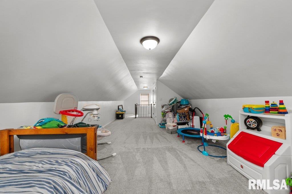 2133 Warren Street Davenport, IA 52804 - Photo 19 of 26 a bedroom with bed and a window