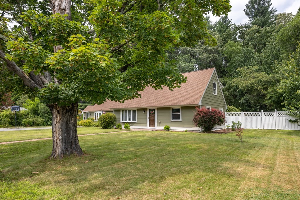 22 Parlee Road Chelmsford, MA 01824 - Photo 3 of 34 a house that has a tree in front of it