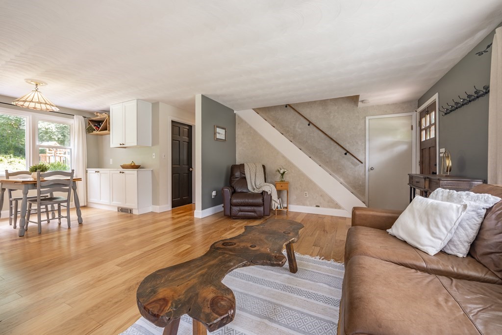 22 Parlee Road Chelmsford, MA 01824 - Photo 8 of 34 a living room with furniture and wooden floor