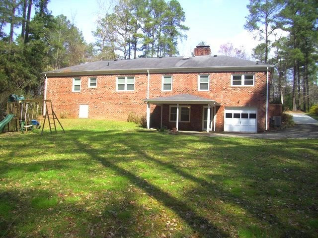 3125 Cartwright Drive Raleigh, NC 27612 - Photo 24 of 25 Huge, private lot in a wonderful, natural setting. Exterior Back