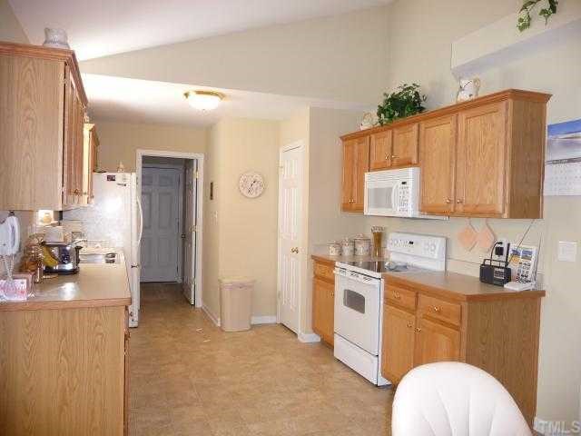 49 River Ridge Way Willow Spring, NC 27592 - Photo 3 of 12 Kitchen with lots of counter space and cabinets