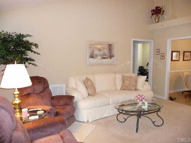 49 River Ridge Way Willow Spring, NC 27592 - Photo 4 of 12 Living Room with plant shelves