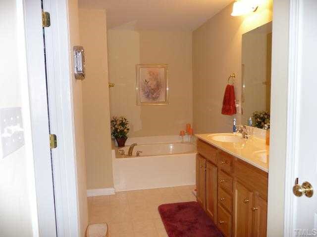 49 River Ridge Way Willow Spring, NC 27592 - Photo 9 of 12 Master Bath, garden tub, double sinks, separate shower, walk in closet
