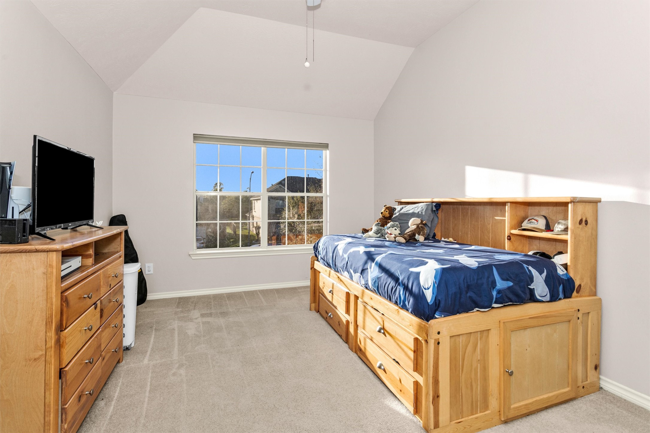 30110 Legends Ridge Drive Spring, TX 77386 - Photo 36 of 49 a spacious bedroom with a bed and a flat screen tv