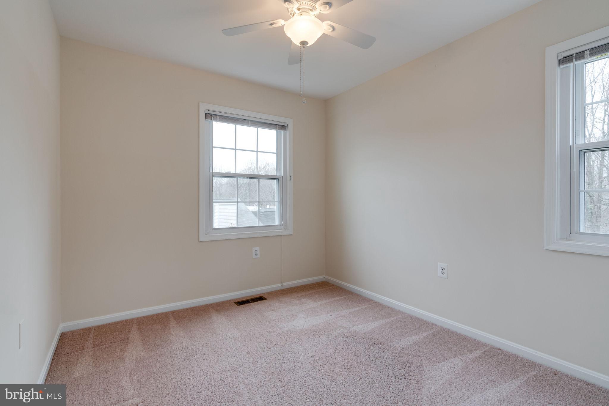 6032 Selwood Place Springfield, VA 22152 - Photo 28 of 42 Bright Second bedroom has ceiling fan.