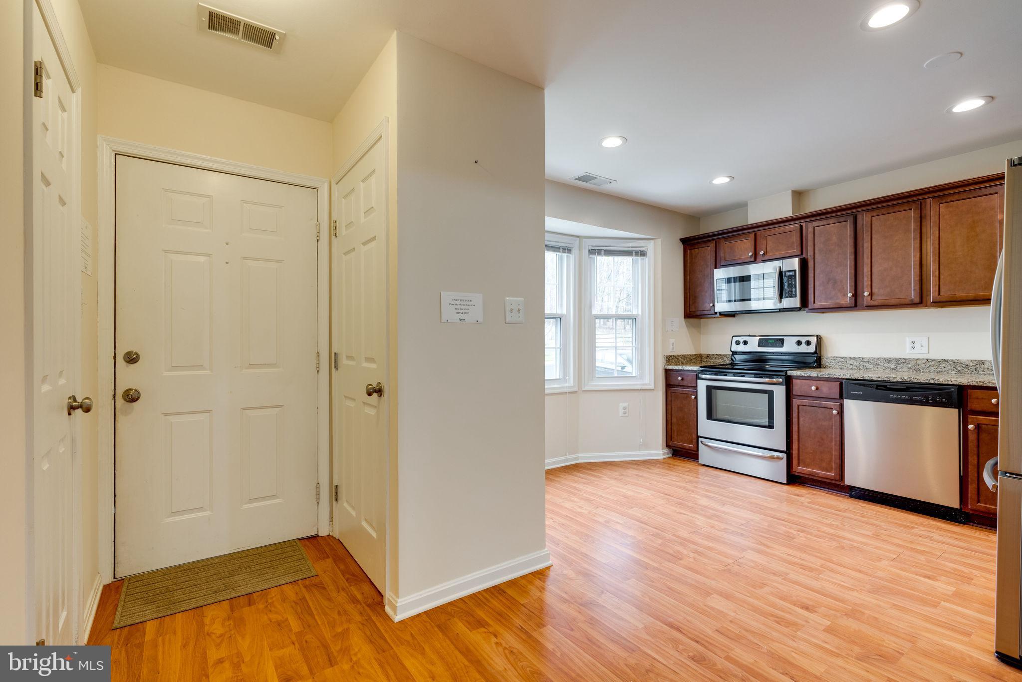6032 Selwood Place Springfield, VA 22152 - Photo 8 of 42 Laminate wood flooring installed in 2016.