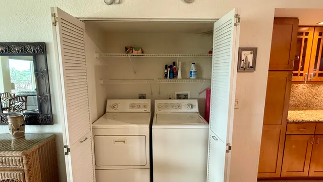 a utility room with dryer and washer