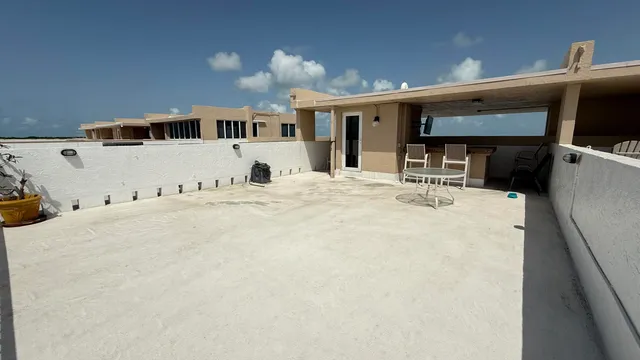 a view of a terrace with sitting area