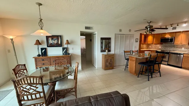 a view of a dining room with furniture