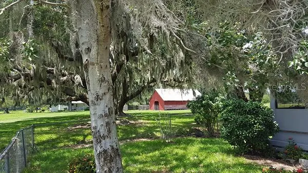 a view of a porch with wooden floor and stairs