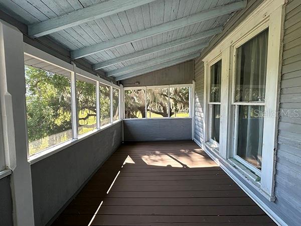 3650 Lake Tohopekaliga Road St. Cloud, FL 34772 - Photo 42 of 61 a view of balcony with wooden floor
