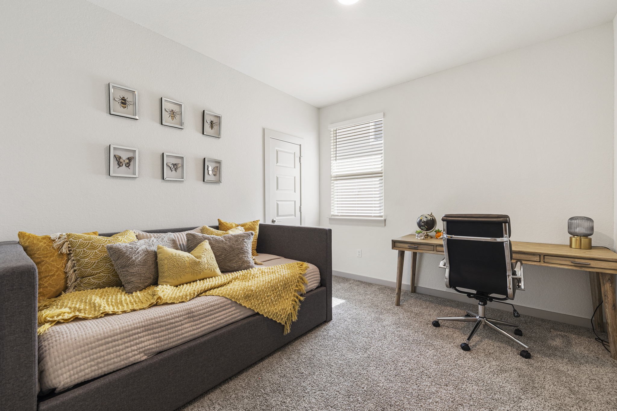 201 Merrick Road Georgetown, TX 78628 - Photo 11 of 20 a living room with furniture and a window