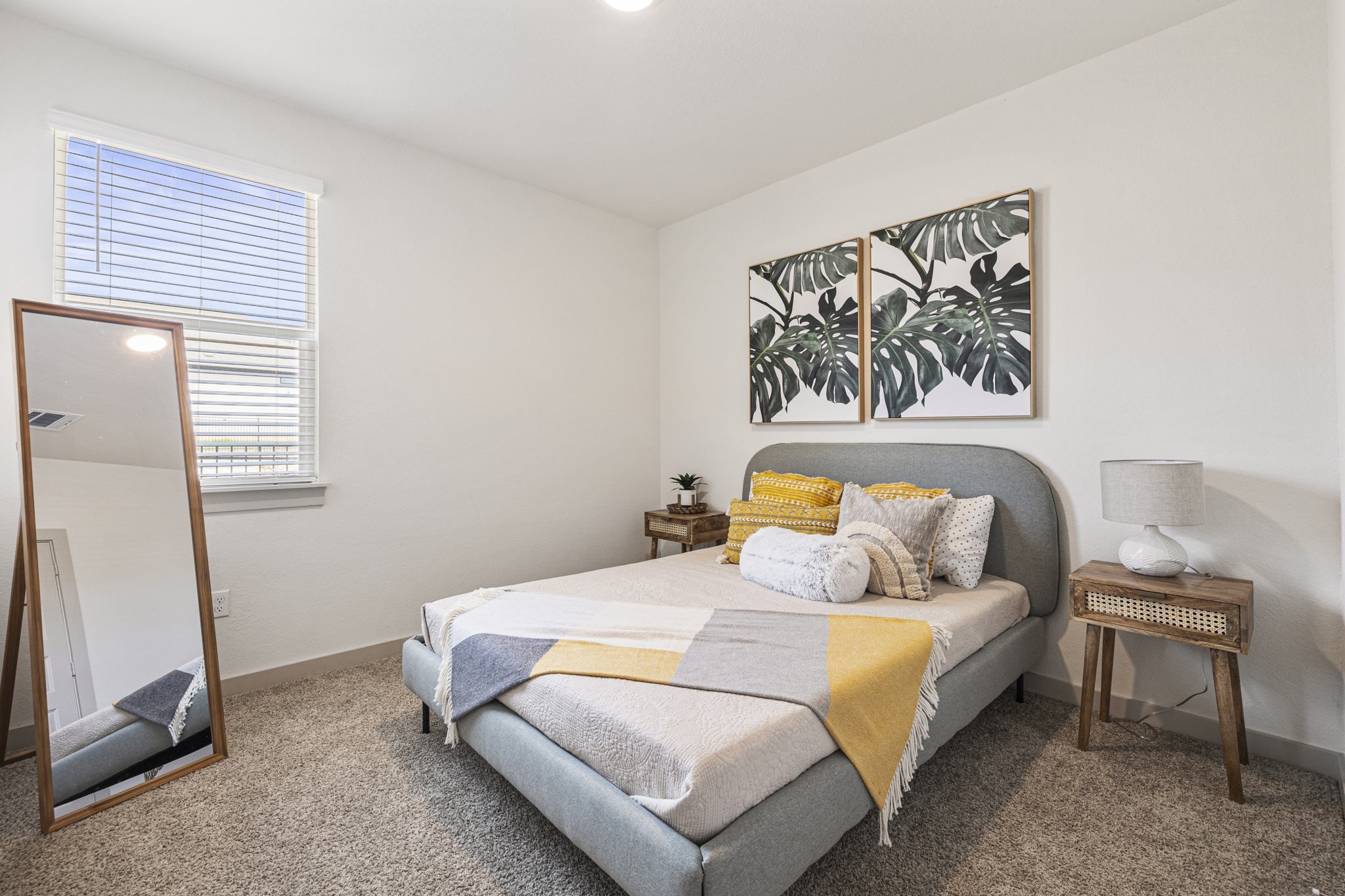 201 Merrick Road Georgetown, TX 78628 - Photo 12 of 20 a bedroom with a bed and a window