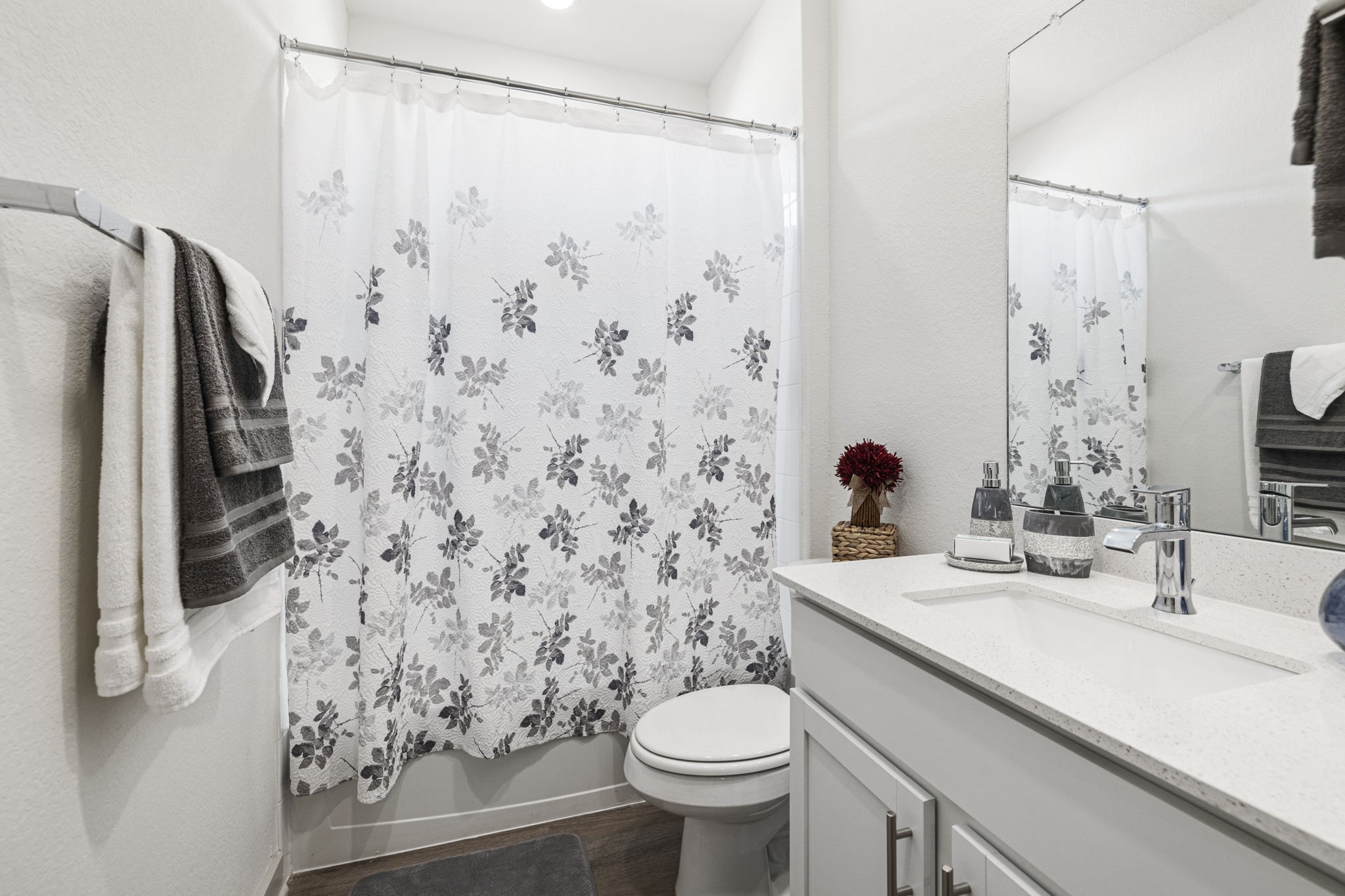 201 Merrick Road Georgetown, TX 78628 - Photo 13 of 20 a bathroom with a sink toilet and shower