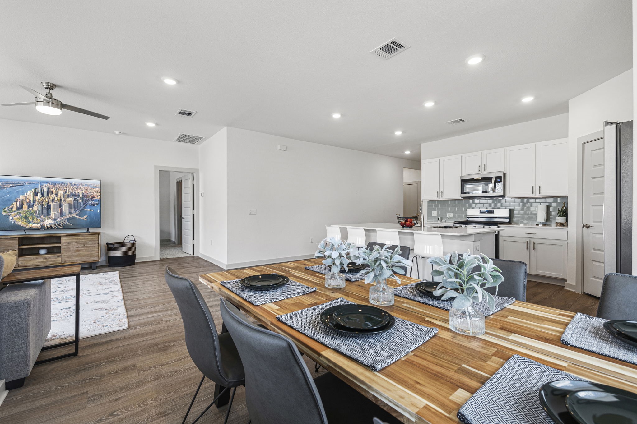 201 Merrick Road Georgetown, TX 78628 - Photo 3 of 20 a kitchen with a table and chairs in it
