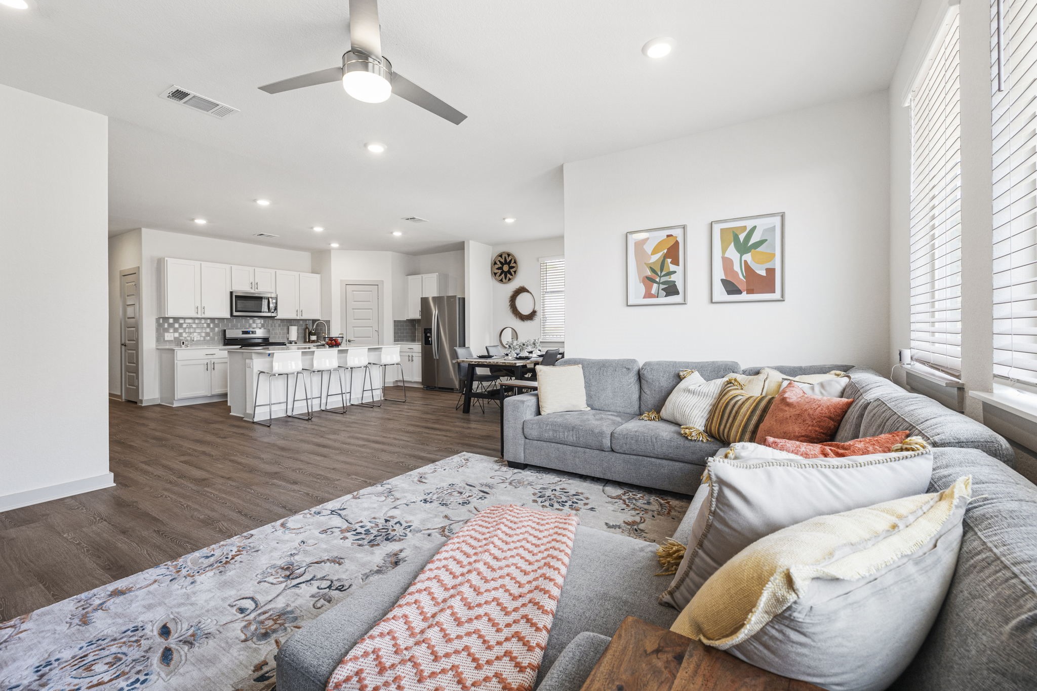 201 Merrick Road Georgetown, TX 78628 - Photo 6 of 20 a living room with furniture and a kitchen view