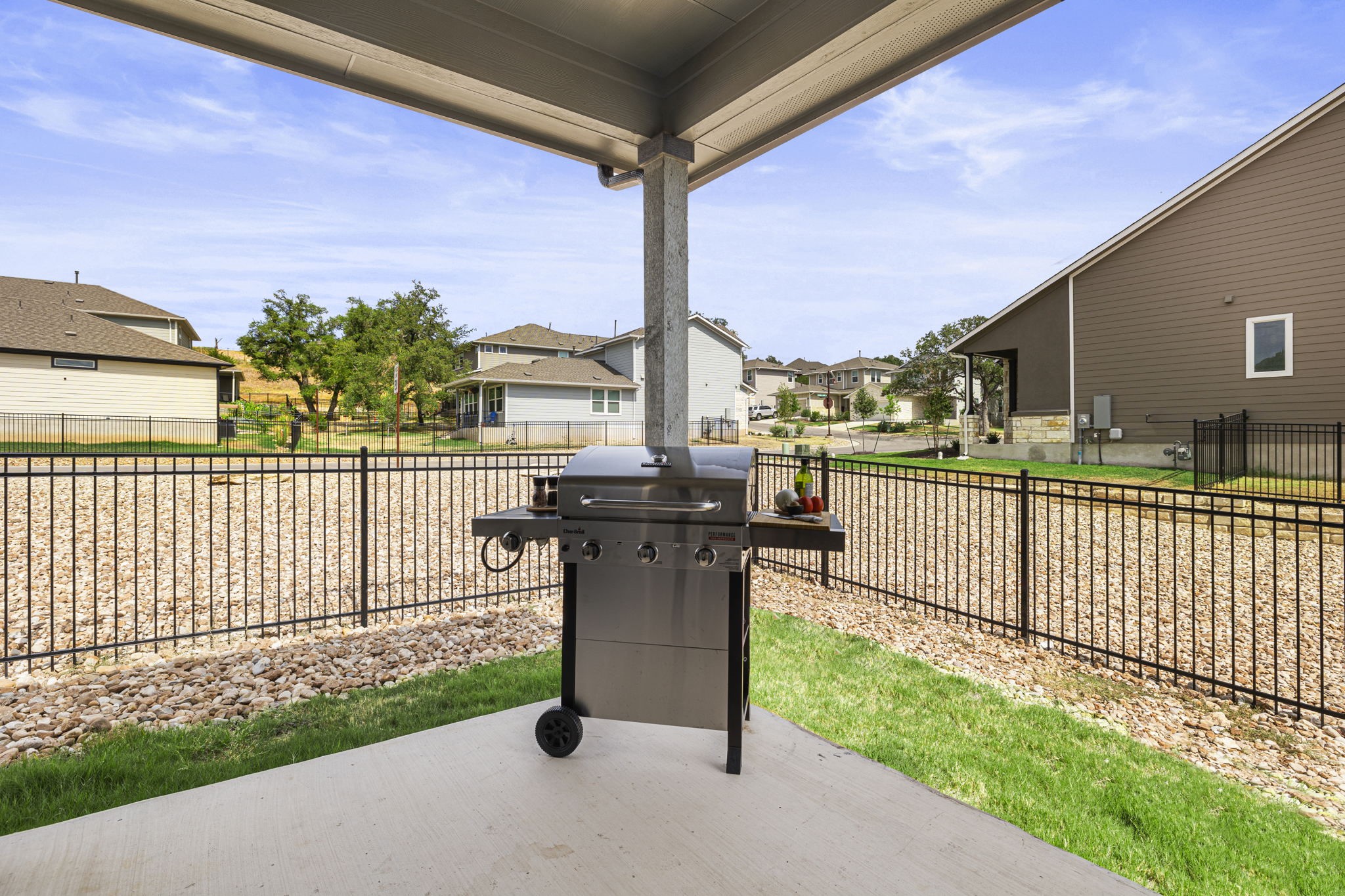201 Merrick Road Georgetown, TX 78628 - Photo 7 of 20 a view of a patio with a table and chairs