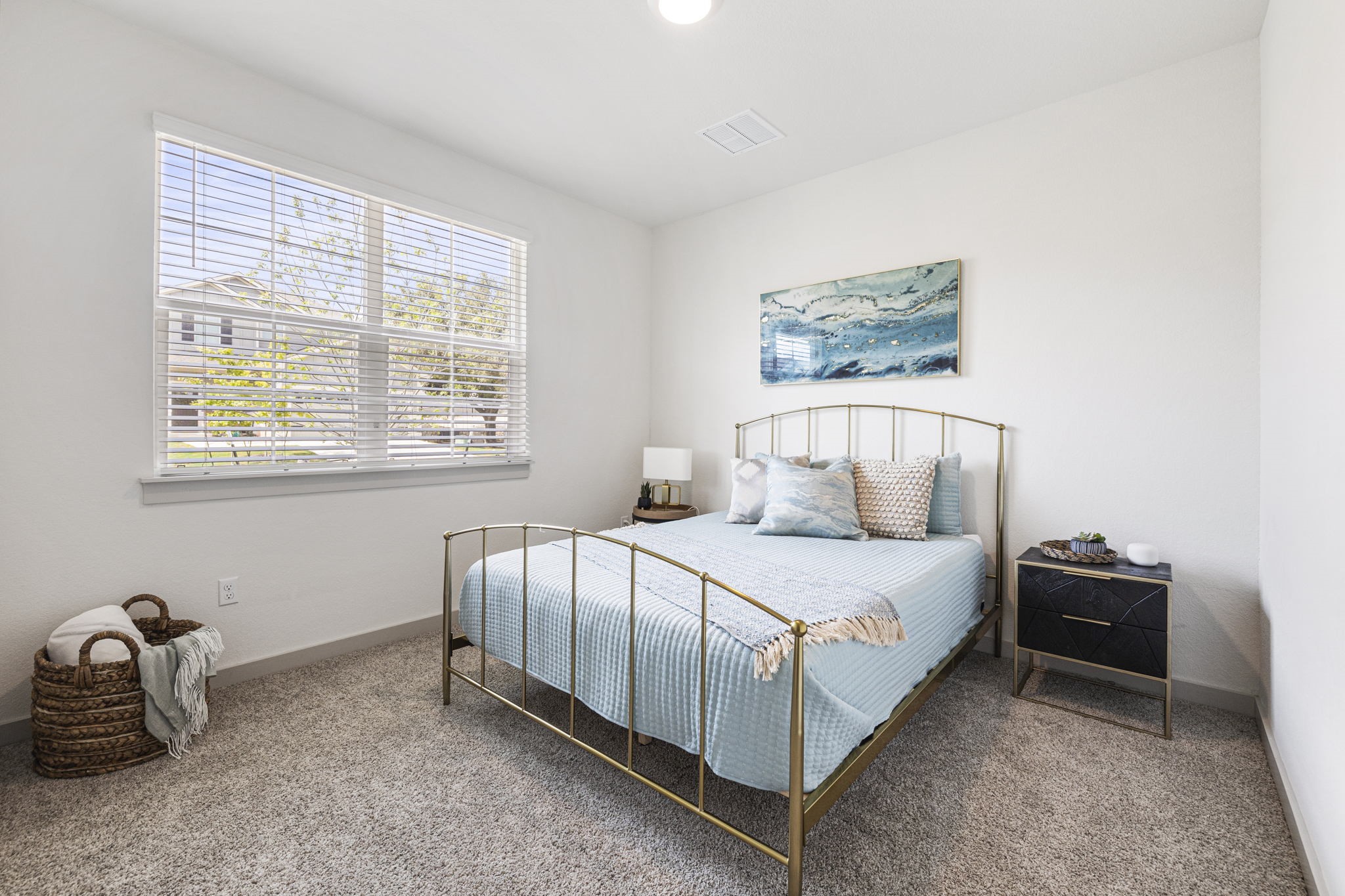 201 Merrick Road Georgetown, TX 78628 - Photo 10 of 20 a bedroom with a bed and a window