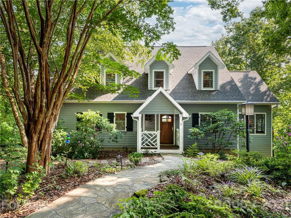 10 Powder Ridge Drive Asheville, NC 28803 - Photo 2 of 46 a front view of a house with garden