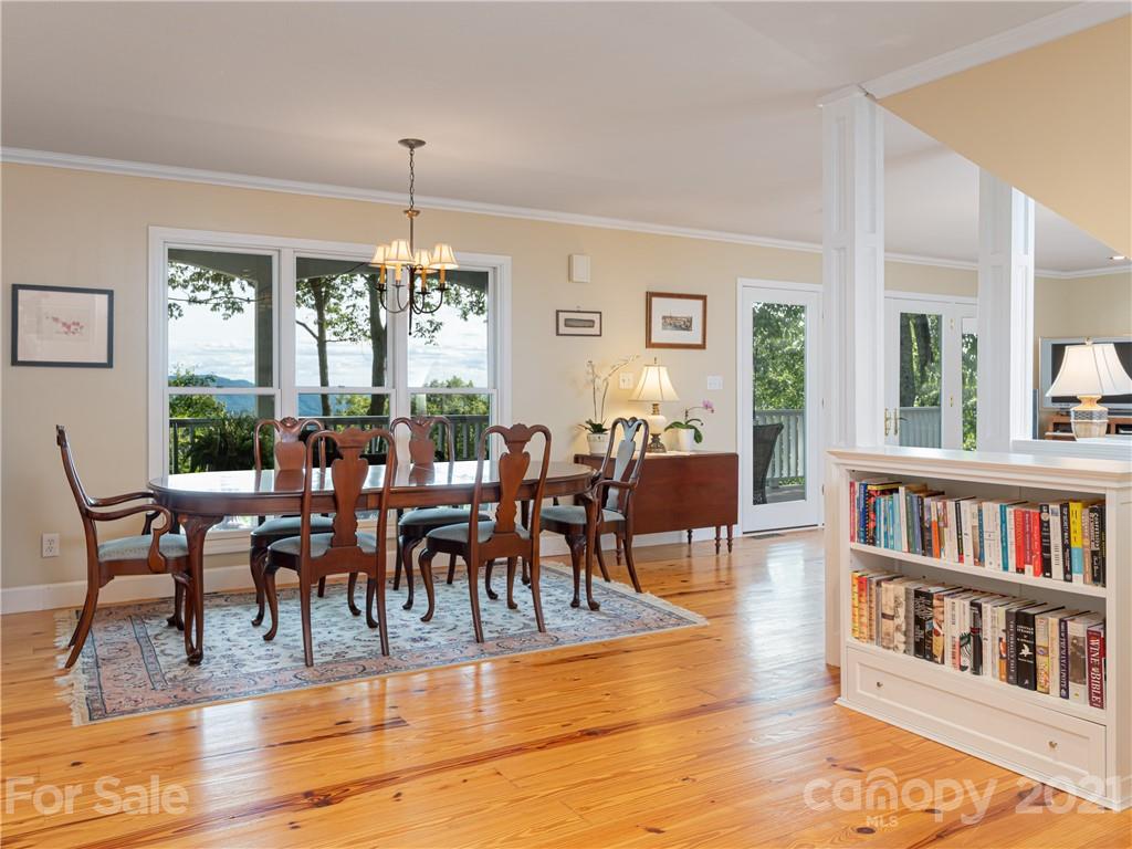10 Powder Ridge Drive Asheville, NC 28803 - Photo 13 of 46 a view of a dining room with furniture window and wooden floor