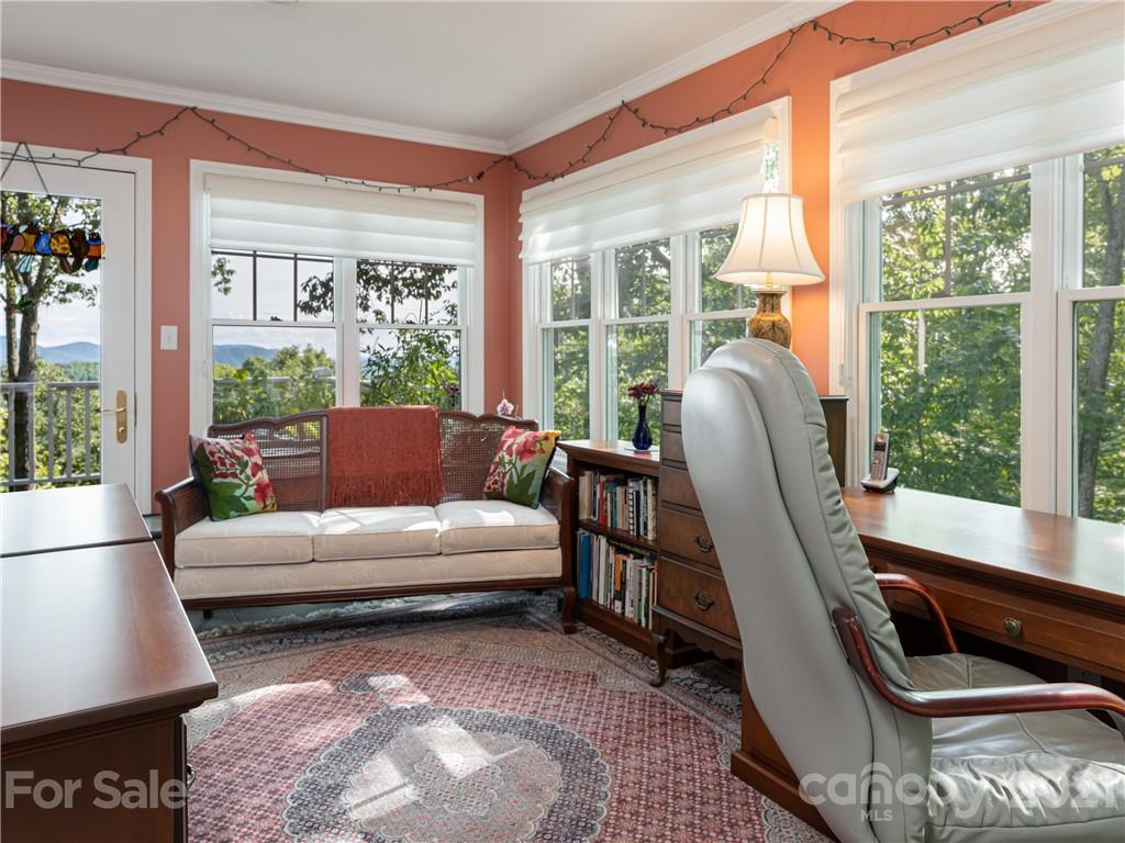 10 Powder Ridge Drive Asheville, NC 28803 - Photo 22 of 46 a living room with furniture and a large window
