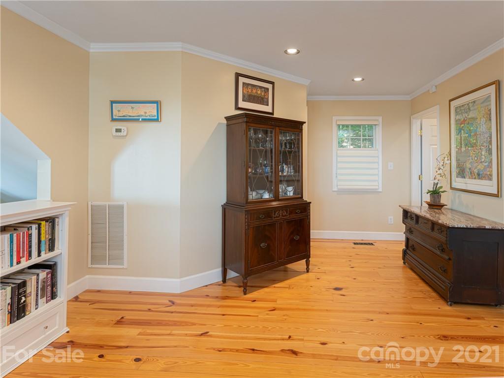 10 Powder Ridge Drive Asheville, NC 28803 - Photo 29 of 46 a living room with furniture and a flat screen tv