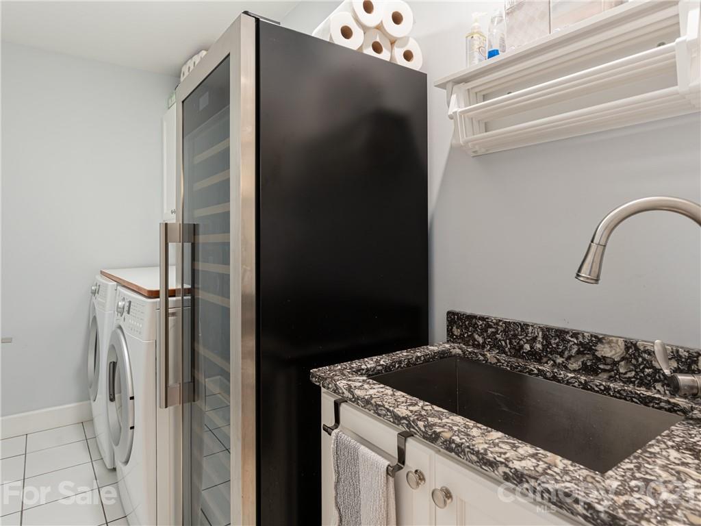 10 Powder Ridge Drive Asheville, NC 28803 - Photo 30 of 46 a kitchen with a refrigerator and a sink
