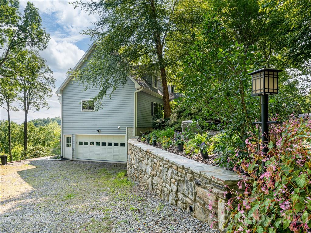 10 Powder Ridge Drive Asheville, NC 28803 - Photo 34 of 46 a sign on the side of a building